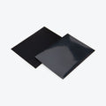 Two black card sleeves, one showing the matte back and one showing the glossy front