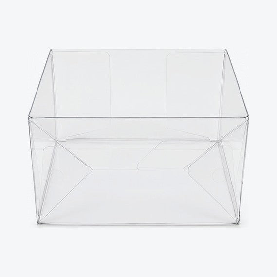 Clear box protector viewed from below, showing the pop-and-lock bottom folds