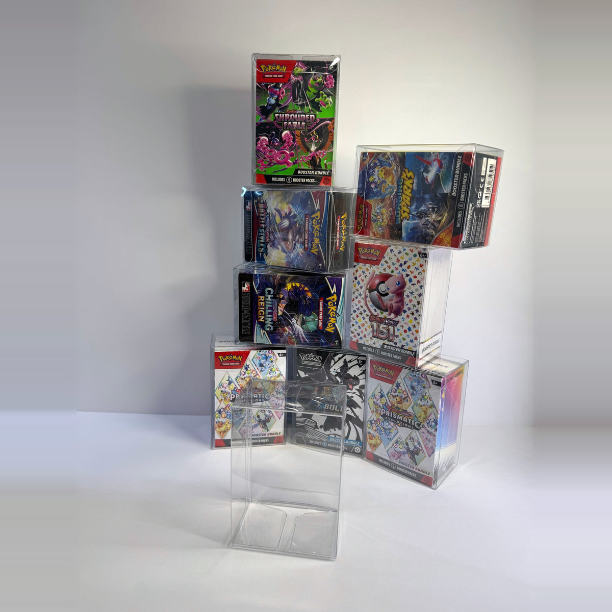 Stack of booster bundles in clear protectors